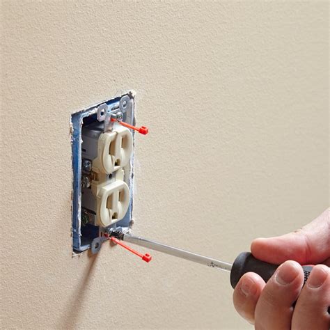 electrical outlet box screw hole stripped|broken screw in electrical box.